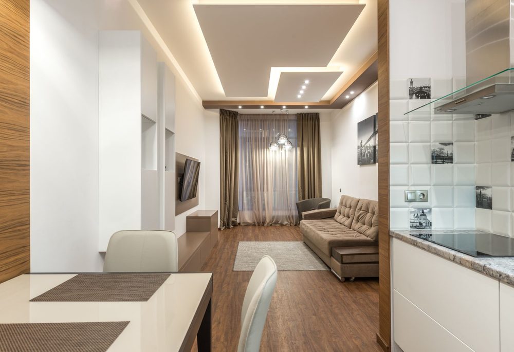 Apartment living room with a flat ceiling below the neighbouring unit